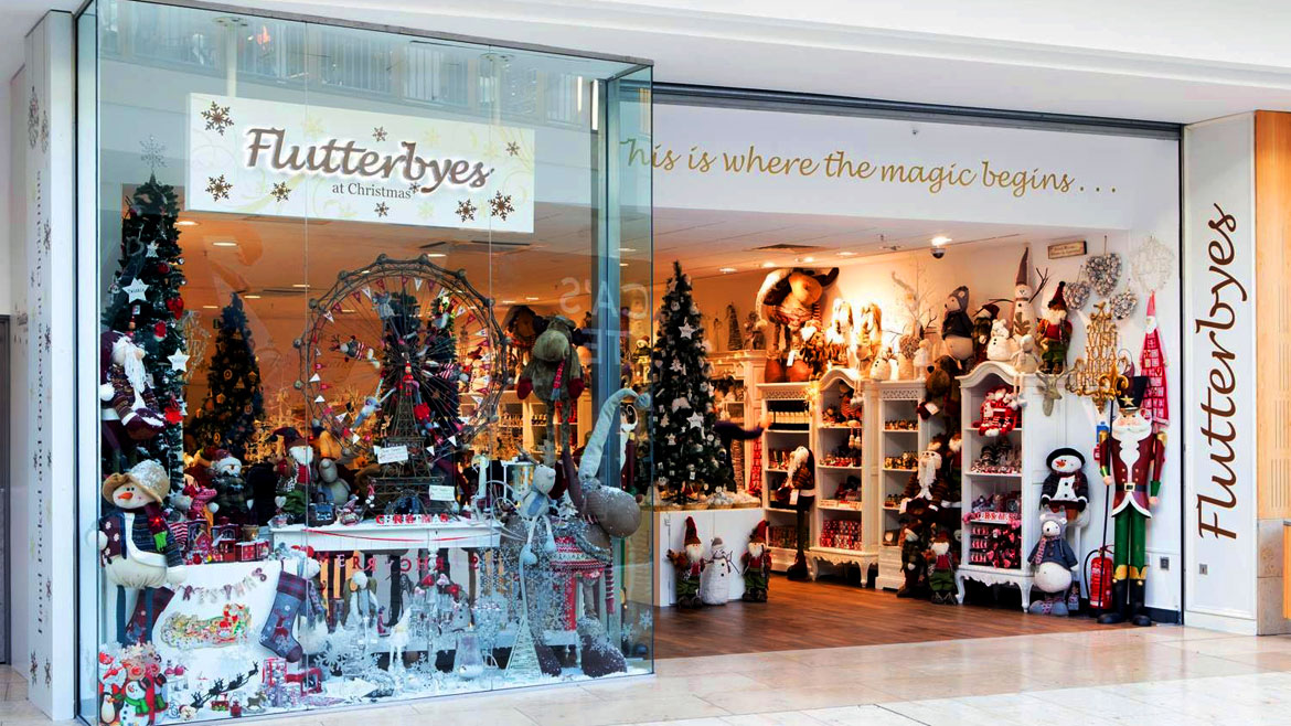 Illuminated store signs for Flutterbyes at Christmas