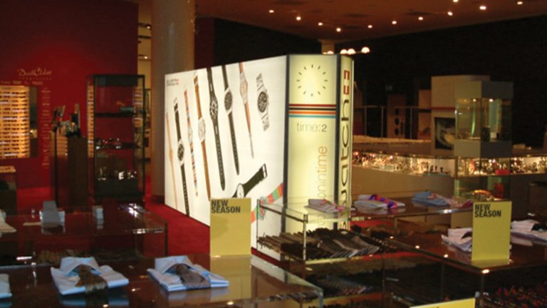 Illuminated-POS-Displays-at-Swatch-Watches-in-a-department-store